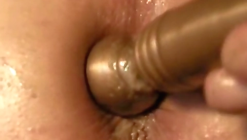 Sexy young girl with a dildo fucks like temper